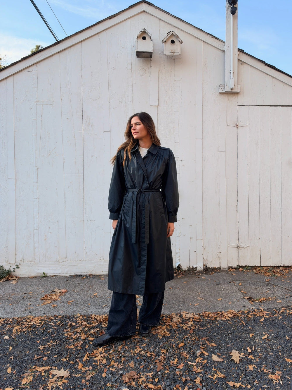 Black vintage trench belted three quarter view
